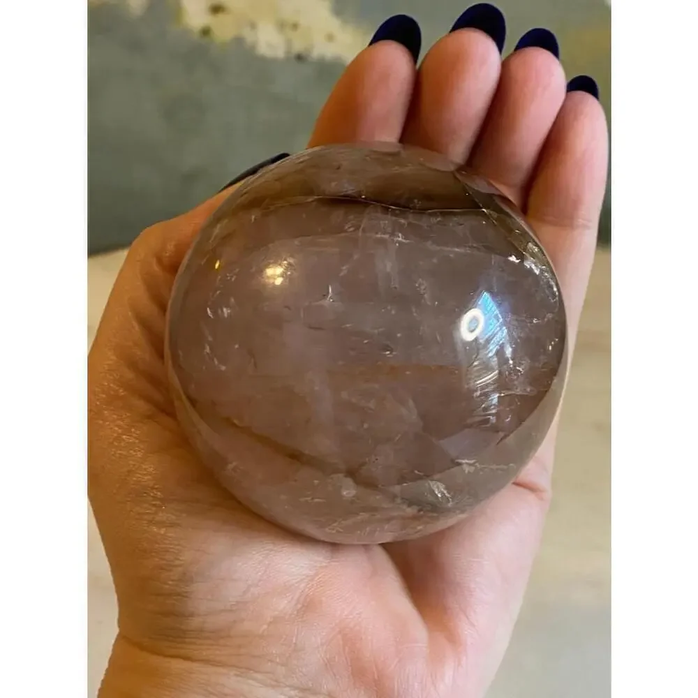 Large hematoid fire quartz sphere